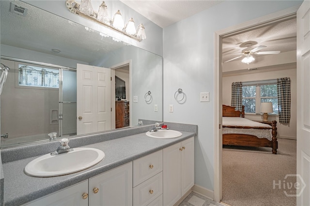 417 Willowpeg Way, Rincon, GA 31326 - full bathroom featuring ensuite bathroom, a ceiling fan, baseboards, an enclosed shower, and double vanity