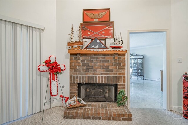 417 Willowpeg Way, Rincon, GA 31326 - detailed view of a brick fireplace, crown molding, carpet flooring, and baseboards