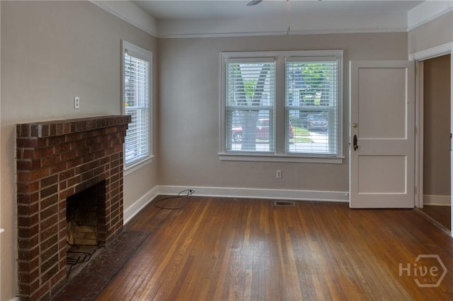 126 E 53rd St, Savannah, GA 31405 - unfurnished living room featuring wood-type flooring, baseboards, and a fireplace