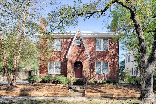 126 E 53rd St, Savannah, GA 31405 - tudor house with brick siding and a chimney