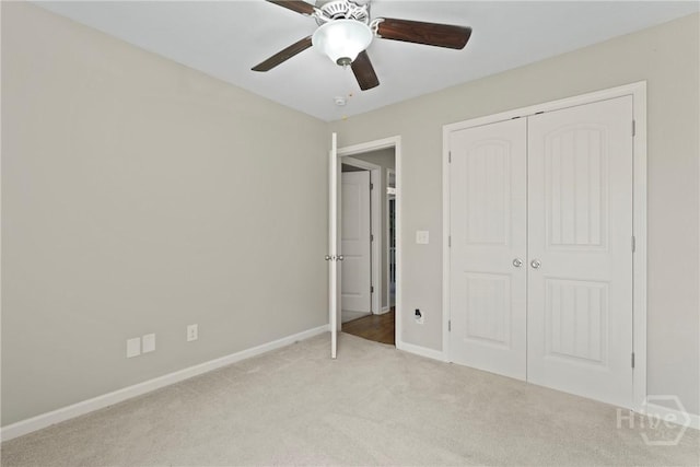 306 Madison Oaks Dr, Rincon, GA 31326 - unfurnished bedroom with light carpet, baseboards, a closet, and a ceiling fan