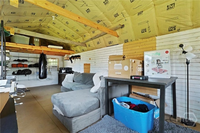 306 Madison Oaks Dr, Rincon, GA 31326 - living room featuring wood walls, vaulted ceiling, and concrete flooring