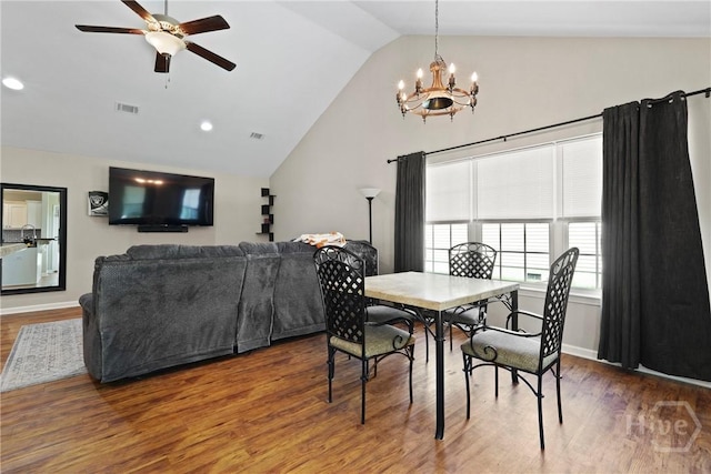 306 Madison Oaks Dr, Rincon, GA 31326 - dining space featuring vaulted ceiling, a chandelier, wood finished floors, a ceiling fan, and baseboards