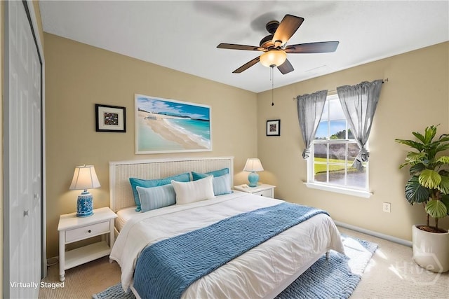 303 Stonebridge Cir, Savannah, GA 31419 - bedroom with carpet flooring, baseboards, and a ceiling fan