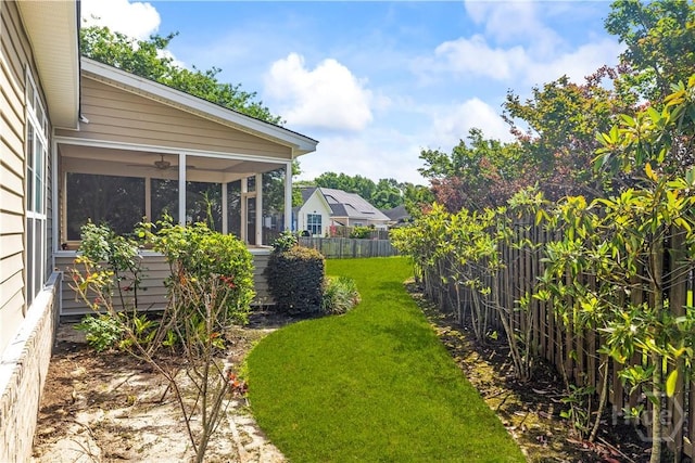 303 Stonebridge Cir, Savannah, GA 31419 - view of yard featuring a sunroom and a ceiling fan