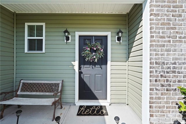 119 Greystone Dr, Guyton, GA 31312 - entrance to property with covered porch and brick siding