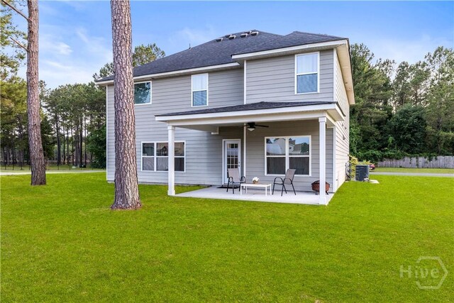 216 Cypress Lakes Dr, Bloomingdale, GA 31302 - rear view of property featuring central AC unit, ceiling fan, a patio, and a yard
