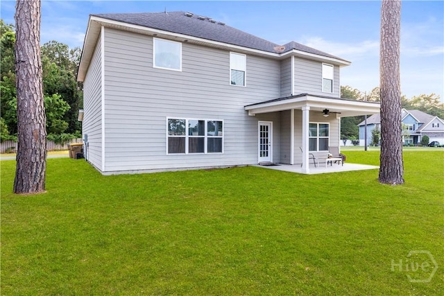 216 Cypress Lakes Dr, Bloomingdale, GA 31302 - back of property with ceiling fan, a patio area, a yard, and roof with shingles