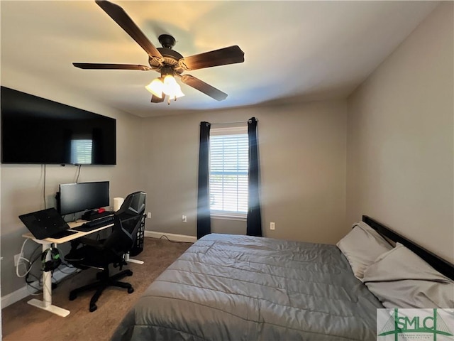 98 Vickers Rd SE, Ludowici, GA 31316 - bedroom with carpet flooring, baseboards, and a ceiling fan