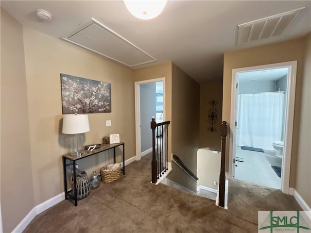 98 Vickers Rd SE, Ludowici, GA 31316 - hall with attic access, an upstairs landing, carpet, and baseboards