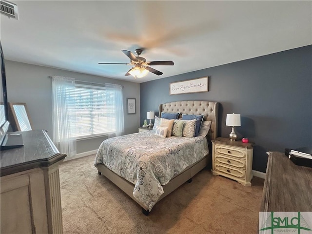 98 Vickers Rd SE, Ludowici, GA 31316 - carpeted bedroom with baseboards and ceiling fan