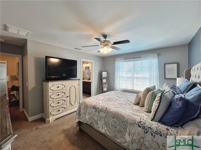 98 Vickers Rd SE, Ludowici, GA 31316 - bedroom featuring light carpet, baseboards, and a ceiling fan