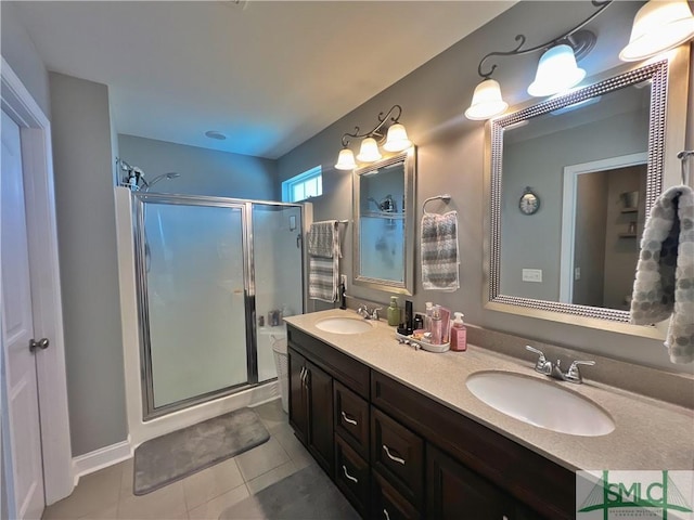 98 Vickers Rd SE, Ludowici, GA 31316 - bathroom with a shower stall, double vanity, and tile patterned floors