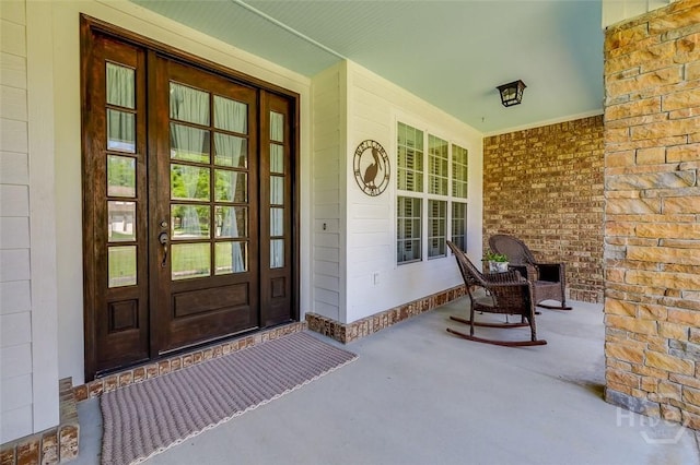 2 N Camellia Ct, Guyton, GA 31312 - entrance to property with french doors and covered porch
