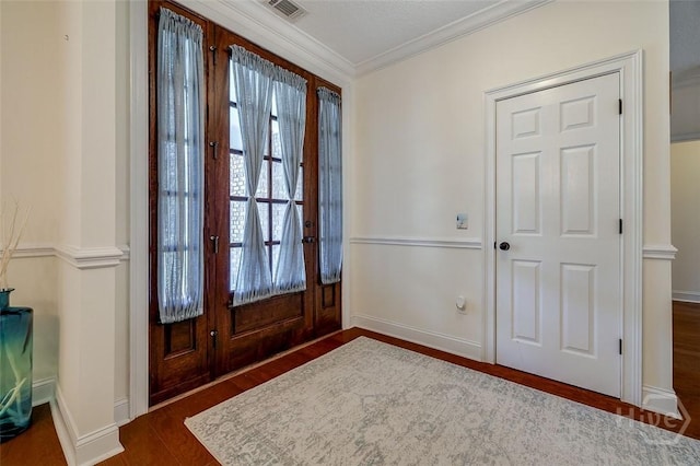 2 N Camellia Ct, Guyton, GA 31312 - entryway with dark wood finished floors, crown molding, and baseboards