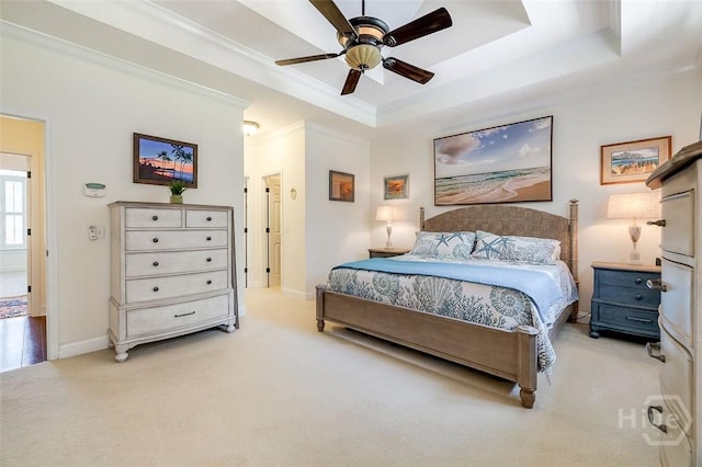 2 N Camellia Ct, Guyton, GA 31312 - bedroom featuring light carpet, ornamental molding, a raised ceiling, baseboards, and ceiling fan