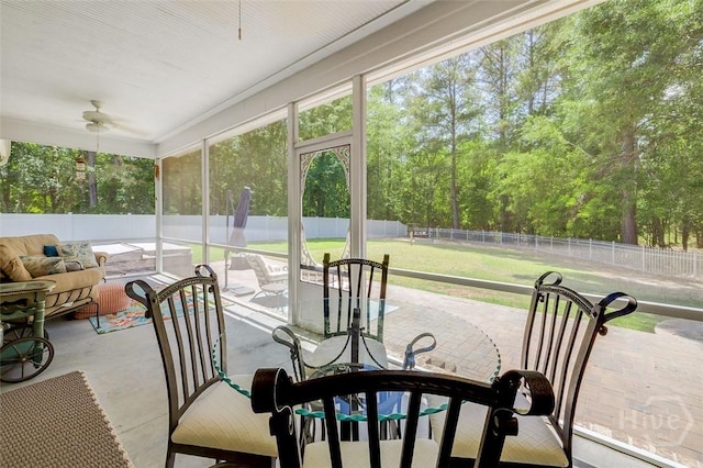 2 N Camellia Ct, Guyton, GA 31312 - sunroom / solarium with a ceiling fan, plenty of natural light, and outdoor dining space