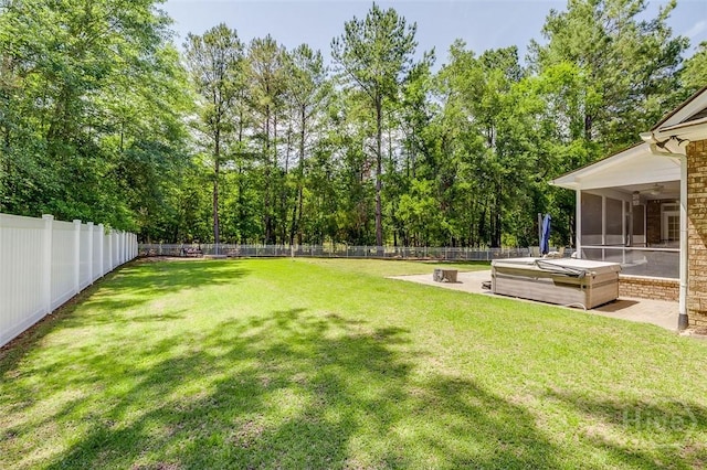 2 N Camellia Ct, Guyton, GA 31312 - view of yard featuring a sunroom, a patio area, and ceiling fan
