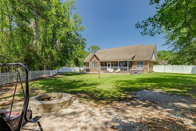 2 N Camellia Ct, Guyton, GA 31312 - view of yard with a fire pit and a patio