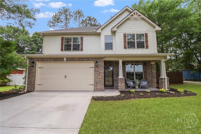 447 Walthour Dr, Rincon, GA 31326 - craftsman house with a porch, brick siding, concrete driveway, an attached garage, and board and batten siding