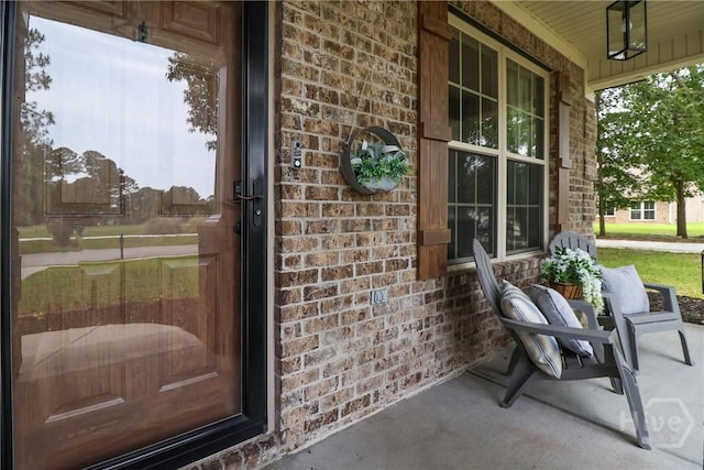 447 Walthour Dr, Rincon, GA 31326 - entrance to property with covered porch and brick siding