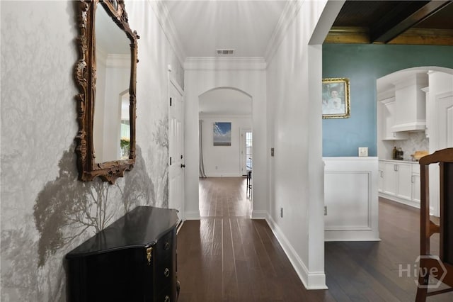 447 Walthour Dr, Rincon, GA 31326 - hall with arched walkways, dark wood-style flooring, and ornamental molding