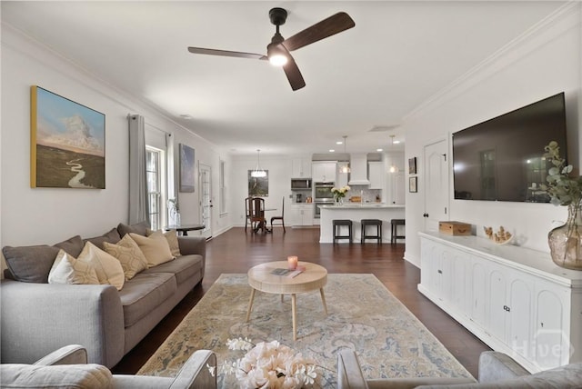 447 Walthour Dr, Rincon, GA 31326 - living area with ceiling fan, crown molding, and dark wood-style flooring