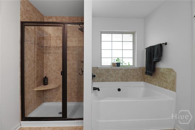 447 Walthour Dr, Rincon, GA 31326 - full bathroom featuring a garden tub and a stall shower