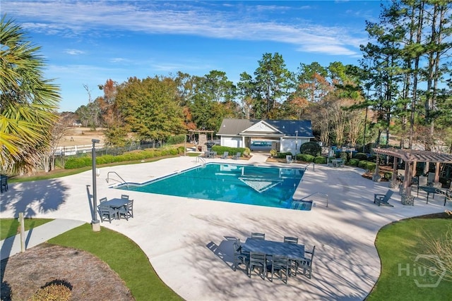 447 Walthour Dr, Rincon, GA 31326 - community pool featuring a pergola and a patio area