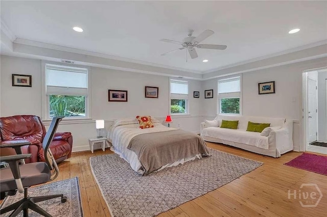 3600 Abercorn St, Savannah, GA 31405 - bedroom featuring light wood-style flooring, ornamental molding, a raised ceiling, recessed lighting, and ceiling fan
