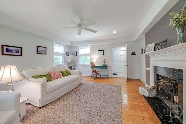 3600 Abercorn St, Savannah, GA 31405 - living area featuring a ceiling fan, light wood-style flooring, crown molding, a premium fireplace, and recessed lighting