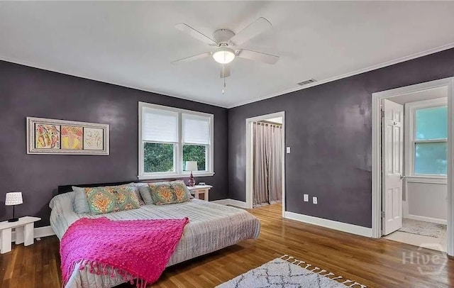 3600 Abercorn St, Savannah, GA 31405 - bedroom featuring wood finished floors, baseboards, and a ceiling fan