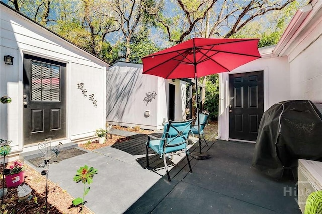 3600 Abercorn St, Savannah, GA 31405 - view of patio with area for grilling and an outbuilding