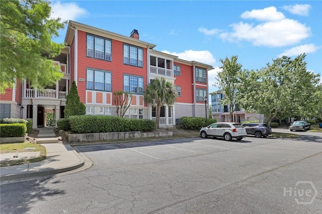 1733 Whitemarsh Way, Savannah, GA 31410 - view of property featuring uncovered parking