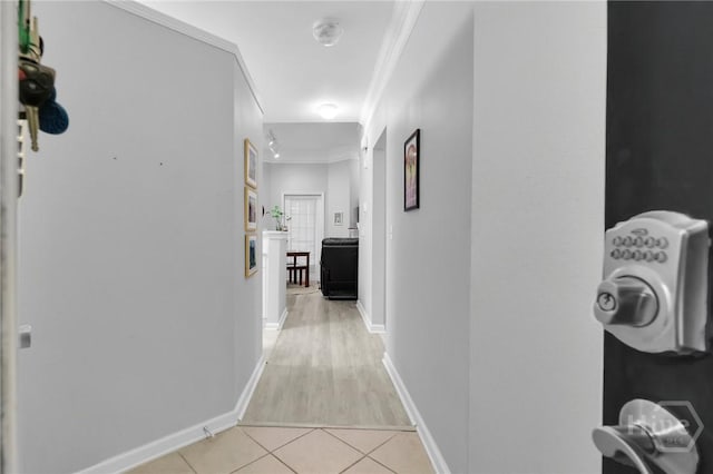 1733 Whitemarsh Way, Savannah, GA 31410 - hallway featuring ornamental molding, light tile patterned floors, and baseboards