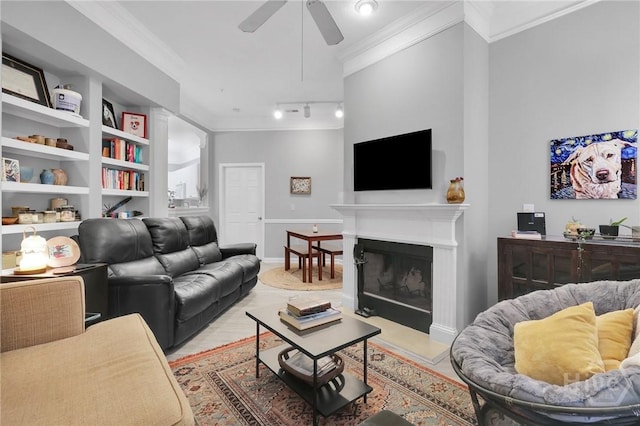1733 Whitemarsh Way, Savannah, GA 31410 - living area featuring ornamental molding, ceiling fan, a fireplace with raised hearth, built in features, and baseboards