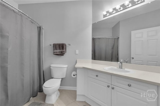 1733 Whitemarsh Way, Savannah, GA 31410 - full bathroom featuring tile patterned floors, toilet, vanity, baseboards, and a shower with shower curtain