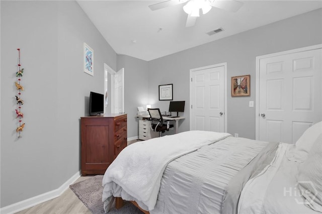 1733 Whitemarsh Way, Savannah, GA 31410 - bedroom with light wood-style floors, baseboards, and a ceiling fan