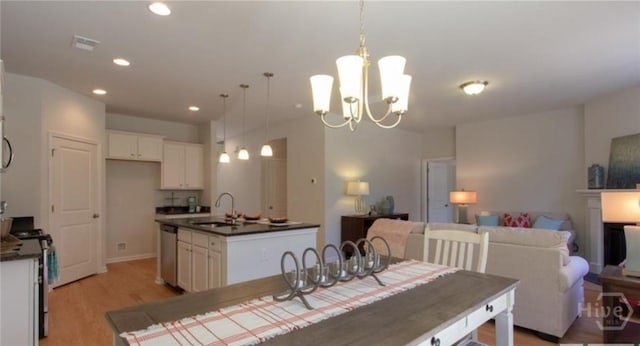 119 Fremont Ln, Pooler, GA 31322 - dining space with light wood-type flooring, recessed lighting, and a chandelier