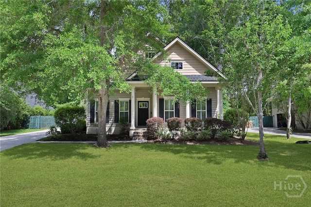 90 Golden Rod Loop, Richmond Hill, GA 31324 - view of front of house featuring a porch