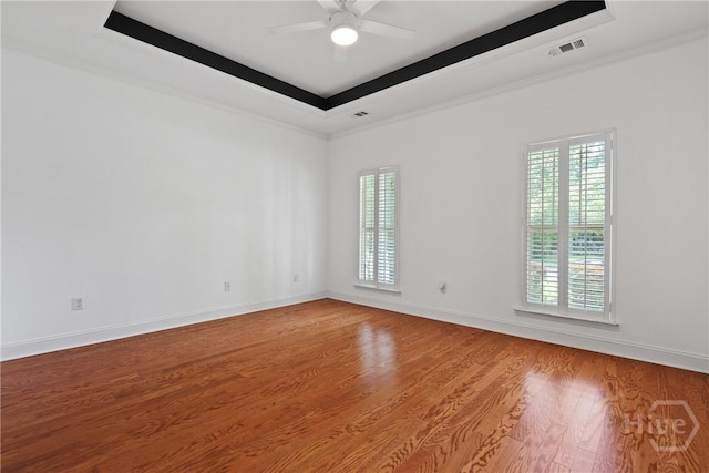 90 Golden Rod Loop, Richmond Hill, GA 31324 - unfurnished room featuring healthy amount of natural light, wood finished floors, ceiling fan, crown molding, and baseboards