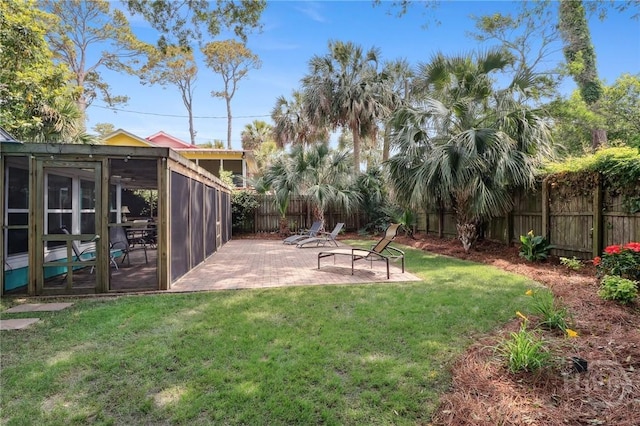1212 2nd Ave, Tybee Island, GA 31328 - view of yard with a sunroom and a patio