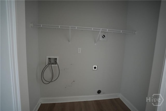 141 Mcclelland Loop NE, Ludowici, GA 31316 - clothes washing area with washer hookup, dark wood-style flooring, baseboards, and hookup for an electric dryer