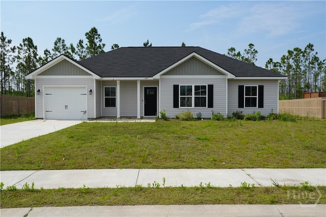 141 Mcclelland Loop NE, Ludowici, GA 31316 - ranch-style home with a garage and driveway