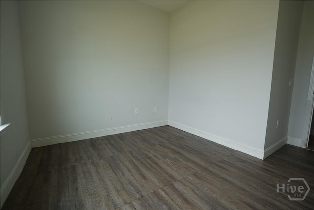 141 Mcclelland Loop NE, Ludowici, GA 31316 - spare room featuring dark wood finished floors and baseboards
