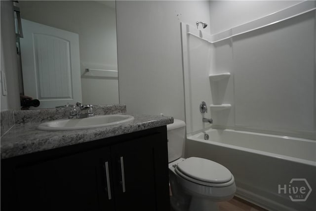 141 Mcclelland Loop NE, Ludowici, GA 31316 - bathroom featuring toilet, vanity, and washtub / shower combination