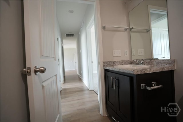 141 Mcclelland Loop NE, Ludowici, GA 31316 - bathroom featuring vanity and wood finished floors