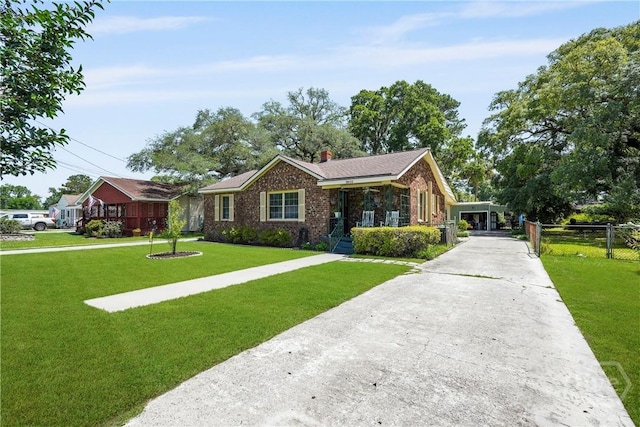 3010 Leonard St, Savannah, GA 31404 - view of front of home with brick siding, driveway, and a chimney