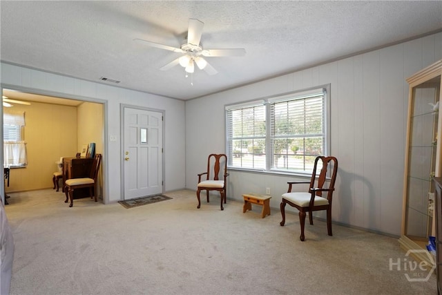 3010 Leonard St, Savannah, GA 31404 - sitting room with a ceiling fan, carpet flooring, and a textured ceiling