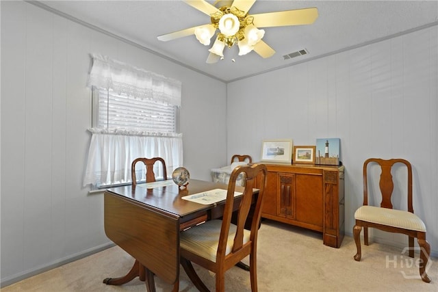3010 Leonard St, Savannah, GA 31404 - dining room with light carpet, ceiling fan, a desk, and ornamental molding